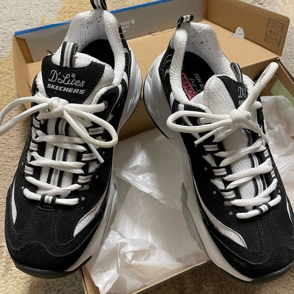 Sketchers d’lites tennis shoes.